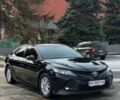 Черный Тойота Камри, объемом двигателя 2.49 л и пробегом 195 тыс. км за 18700 $, фото 1 на Automoto.ua