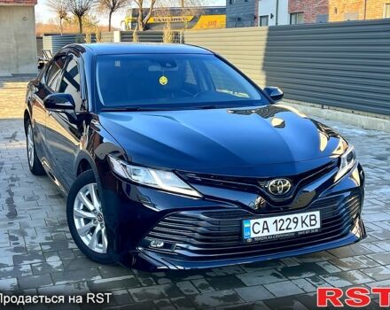 Черный Тойота Камри, объемом двигателя 2.5 л и пробегом 71 тыс. км за 22950 $, фото 1 на Automoto.ua