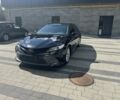 Черный Тойота Камри, объемом двигателя 2.5 л и пробегом 210 тыс. км за 20896 $, фото 1 на Automoto.ua