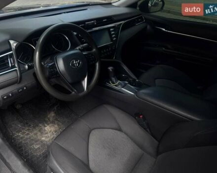 Черный Тойота Камри, объемом двигателя 2.49 л и пробегом 130 тыс. км за 21000 $, фото 1 на Automoto.ua