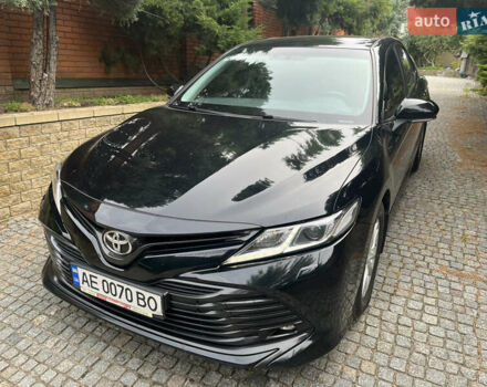 Черный Тойота Камри, объемом двигателя 2.49 л и пробегом 77 тыс. км за 24500 $, фото 1 на Automoto.ua
