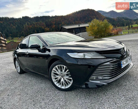 Черный Тойота Камри, объемом двигателя 2.49 л и пробегом 206 тыс. км за 23500 $, фото 1 на Automoto.ua