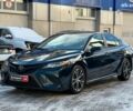 Черный Тойота Камри, объемом двигателя 2.5 л и пробегом 114 тыс. км за 20490 $, фото 1 на Automoto.ua