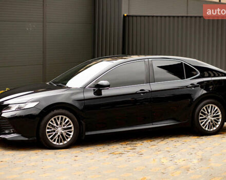 Черный Тойота Камри, объемом двигателя 2.49 л и пробегом 120 тыс. км за 23000 $, фото 1 на Automoto.ua