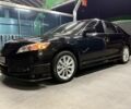 Черный Тойота Камри, объемом двигателя 2.4 л и пробегом 251 тыс. км за 11990 $, фото 1 на Automoto.ua