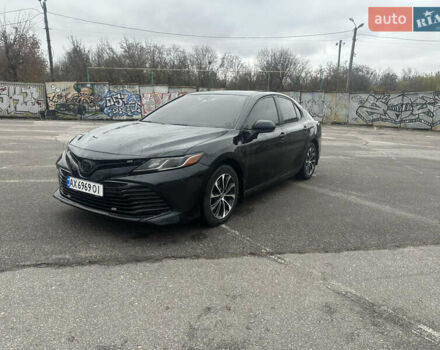 Черный Тойота Камри, объемом двигателя 2.49 л и пробегом 210 тыс. км за 18000 $, фото 1 на Automoto.ua
