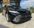 Черный Тойота Камри, объемом двигателя 2.5 л и пробегом 100 тыс. км за 23000 $, фото 1 на Automoto.ua
