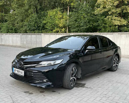 Черный Тойота Камри, объемом двигателя 2.49 л и пробегом 123 тыс. км за 20000 $, фото 1 на Automoto.ua