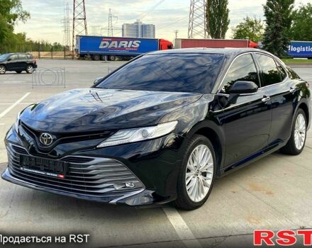 Черный Тойота Камри, объемом двигателя 2.5 л и пробегом 205 тыс. км за 22300 $, фото 1 на Automoto.ua