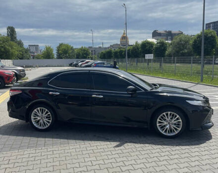 Чорний Тойота Камрі, об'ємом двигуна 2.49 л та пробігом 107 тис. км за 27000 $, фото 2 на Automoto.ua