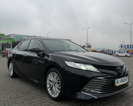 Черный Тойота Камри, объемом двигателя 2.49 л и пробегом 163 тыс. км за 22000 $, фото 1 на Automoto.ua