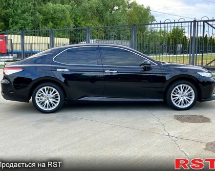 Черный Тойота Камри, объемом двигателя 2.5 л и пробегом 199 тыс. км за 22900 $, фото 2 на Automoto.ua