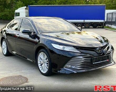 Чорний Тойота Камрі, об'ємом двигуна 2.5 л та пробігом 205 тис. км за 21300 $, фото 1 на Automoto.ua
