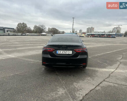 Черный Тойота Камри, объемом двигателя 2.49 л и пробегом 210 тыс. км за 18000 $, фото 3 на Automoto.ua