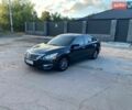 Черный Тойота Камри, объемом двигателя 2.5 л и пробегом 157 тыс. км за 21579 $, фото 1 на Automoto.ua