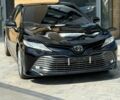 Черный Тойота Камри, объемом двигателя 2.5 л и пробегом 100 тыс. км за 23000 $, фото 1 на Automoto.ua