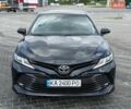 Черный Тойота Камри, объемом двигателя 2.5 л и пробегом 159 тыс. км за 22400 $, фото 1 на Automoto.ua