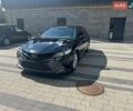 Чорний Тойота Камрі, об'ємом двигуна 2.49 л та пробігом 210 тис. км за 21500 $, фото 1 на Automoto.ua