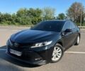Черный Тойота Камри, объемом двигателя 2.49 л и пробегом 195 тыс. км за 18500 $, фото 1 на Automoto.ua