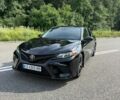 Черный Тойота Камри, объемом двигателя 2.49 л и пробегом 135 тыс. км за 18700 $, фото 1 на Automoto.ua
