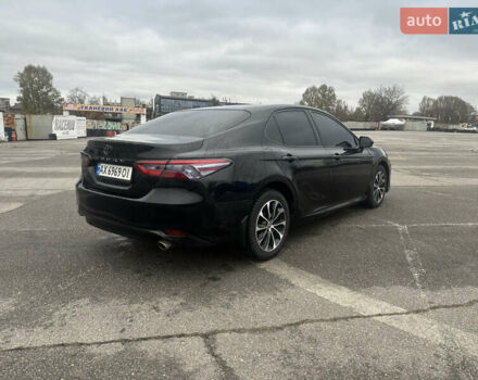 Черный Тойота Камри, объемом двигателя 2.49 л и пробегом 210 тыс. км за 18000 $, фото 4 на Automoto.ua