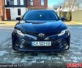 Черный Тойота Камри, объемом двигателя 2.5 л и пробегом 71 тыс. км за 22950 $, фото 1 на Automoto.ua