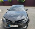 Черный Тойота Камри, объемом двигателя 2.49 л и пробегом 165 тыс. км за 19500 $, фото 1 на Automoto.ua
