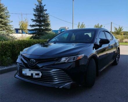 Черный Тойота Камри, объемом двигателя 2.5 л и пробегом 139 тыс. км за 21500 $, фото 1 на Automoto.ua