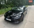Черный Тойота Камри, объемом двигателя 2.49 л и пробегом 136 тыс. км за 21000 $, фото 1 на Automoto.ua