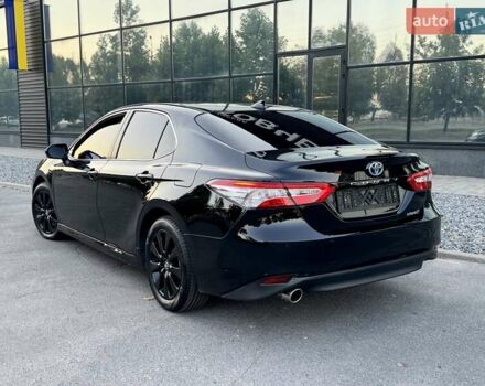 Черный Тойота Камри, объемом двигателя 2.49 л и пробегом 142 тыс. км за 21900 $, фото 1 на Automoto.ua