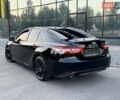 Черный Тойота Камри, объемом двигателя 2.49 л и пробегом 142 тыс. км за 21900 $, фото 1 на Automoto.ua
