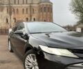 Чорний Тойота Камрі, об'ємом двигуна 2.49 л та пробігом 330 тис. км за 24500 $, фото 1 на Automoto.ua