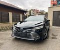 Черный Тойота Камри, объемом двигателя 2.49 л и пробегом 215 тыс. км за 27000 $, фото 1 на Automoto.ua