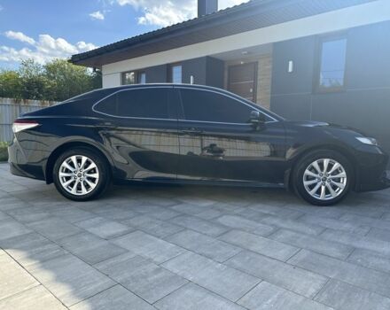 Черный Тойота Камри, объемом двигателя 2.5 л и пробегом 140 тыс. км за 20600 $, фото 1 на Automoto.ua