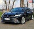 Черный Тойота Камри, объемом двигателя 2.5 л и пробегом 259 тыс. км за 23900 $, фото 1 на Automoto.ua