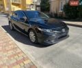Черный Тойота Камри, объемом двигателя 2.5 л и пробегом 192 тыс. км за 18400 $, фото 1 на Automoto.ua
