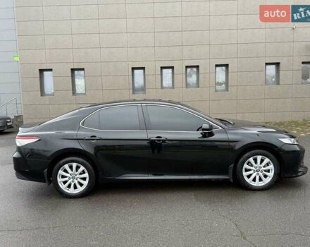 Черный Тойота Камри, объемом двигателя 2.5 л и пробегом 70 тыс. км за 20900 $, фото 1 на Automoto.ua