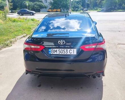 Черный Тойота Камри, объемом двигателя 2.49 л и пробегом 127 тыс. км за 21500 $, фото 1 на Automoto.ua