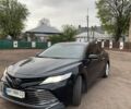 Чорний Тойота Камрі, об'ємом двигуна 2.49 л та пробігом 330 тис. км за 24500 $, фото 1 на Automoto.ua