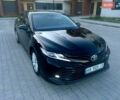 Черный Тойота Камри, объемом двигателя 2.49 л и пробегом 127 тыс. км за 20700 $, фото 1 на Automoto.ua