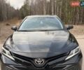 Черный Тойота Камри, объемом двигателя 2.49 л и пробегом 125 тыс. км за 23400 $, фото 1 на Automoto.ua