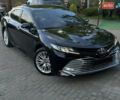 Черный Тойота Камри, объемом двигателя 2.5 л и пробегом 70 тыс. км за 31000 $, фото 1 на Automoto.ua