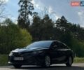 Черный Тойота Камри, объемом двигателя 2.49 л и пробегом 59 тыс. км за 21000 $, фото 1 на Automoto.ua