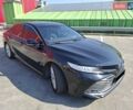 Черный Тойота Камри, объемом двигателя 2.49 л и пробегом 187 тыс. км за 26500 $, фото 1 на Automoto.ua