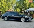 Чорний Тойота Камрі, об'ємом двигуна 2.5 л та пробігом 79 тис. км за 30400 $, фото 1 на Automoto.ua