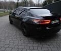 Черный Тойота Камри, объемом двигателя 2.5 л и пробегом 143 тыс. км за 27500 $, фото 1 на Automoto.ua