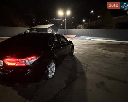 Черный Тойота Камри, объемом двигателя 2.49 л и пробегом 125 тыс. км за 29300 $, фото 1 на Automoto.ua