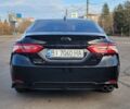 Черный Тойота Камри, объемом двигателя 2.5 л и пробегом 80 тыс. км за 23500 $, фото 6 на Automoto.ua