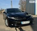 Черный Тойота Камри, объемом двигателя 2.49 л и пробегом 156 тыс. км за 24000 $, фото 1 на Automoto.ua