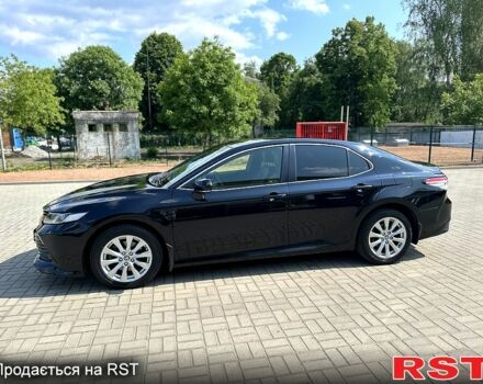 Черный Тойота Камри, объемом двигателя 2.5 л и пробегом 115 тыс. км за 24500 $, фото 1 на Automoto.ua